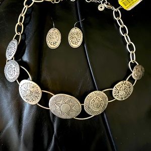 Silver metal, flower, design, necklace, and earrings, 23 inches long